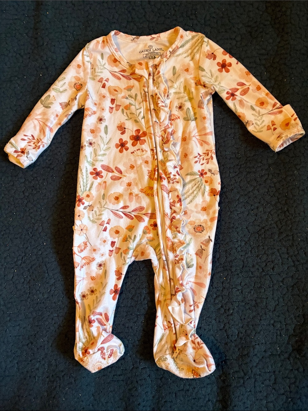 Caden Lane white Peach Floral Ruffle Zip Footed One-Piece